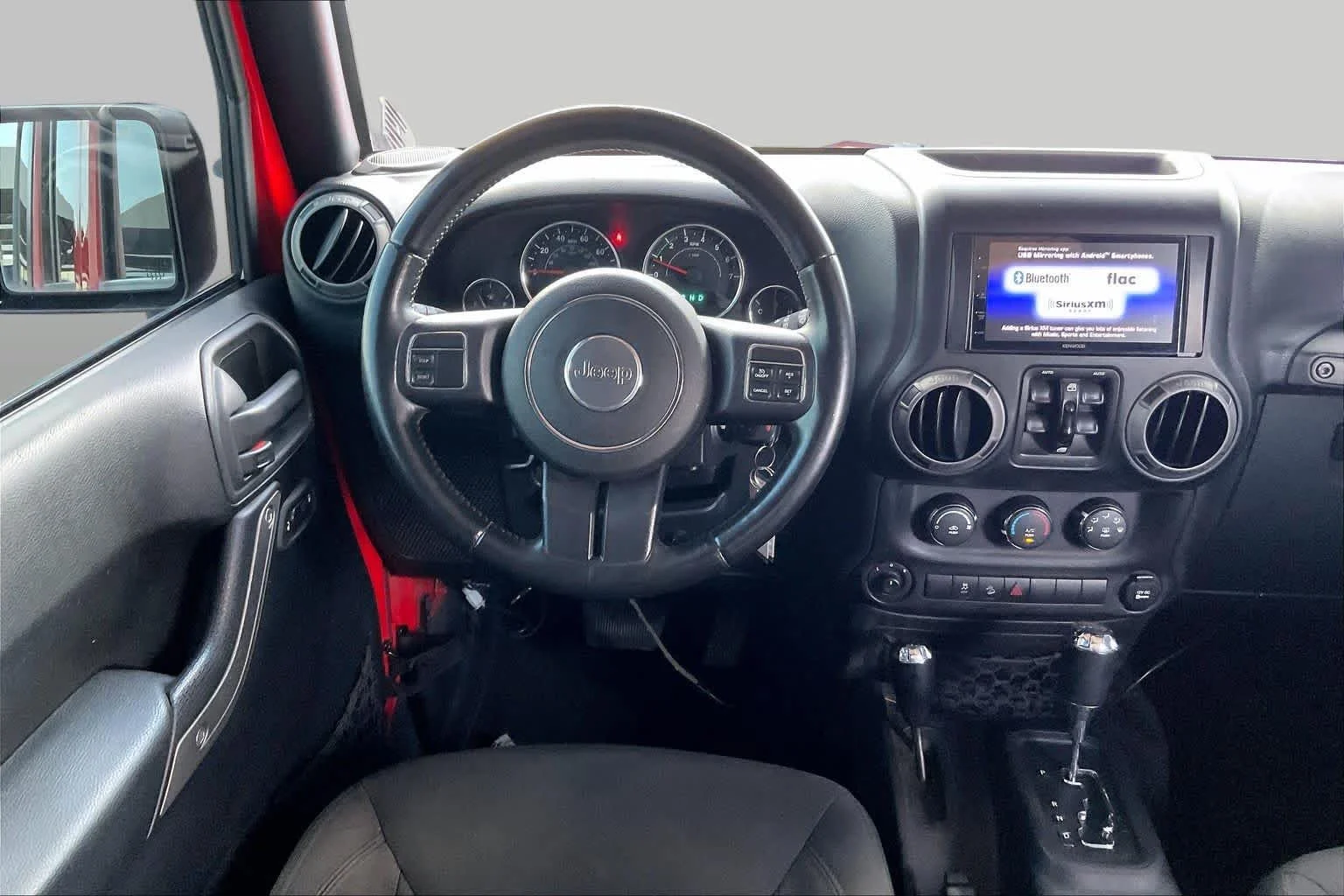Used 2015 Firecracker Red Clear Coat Jeep Sport image 5