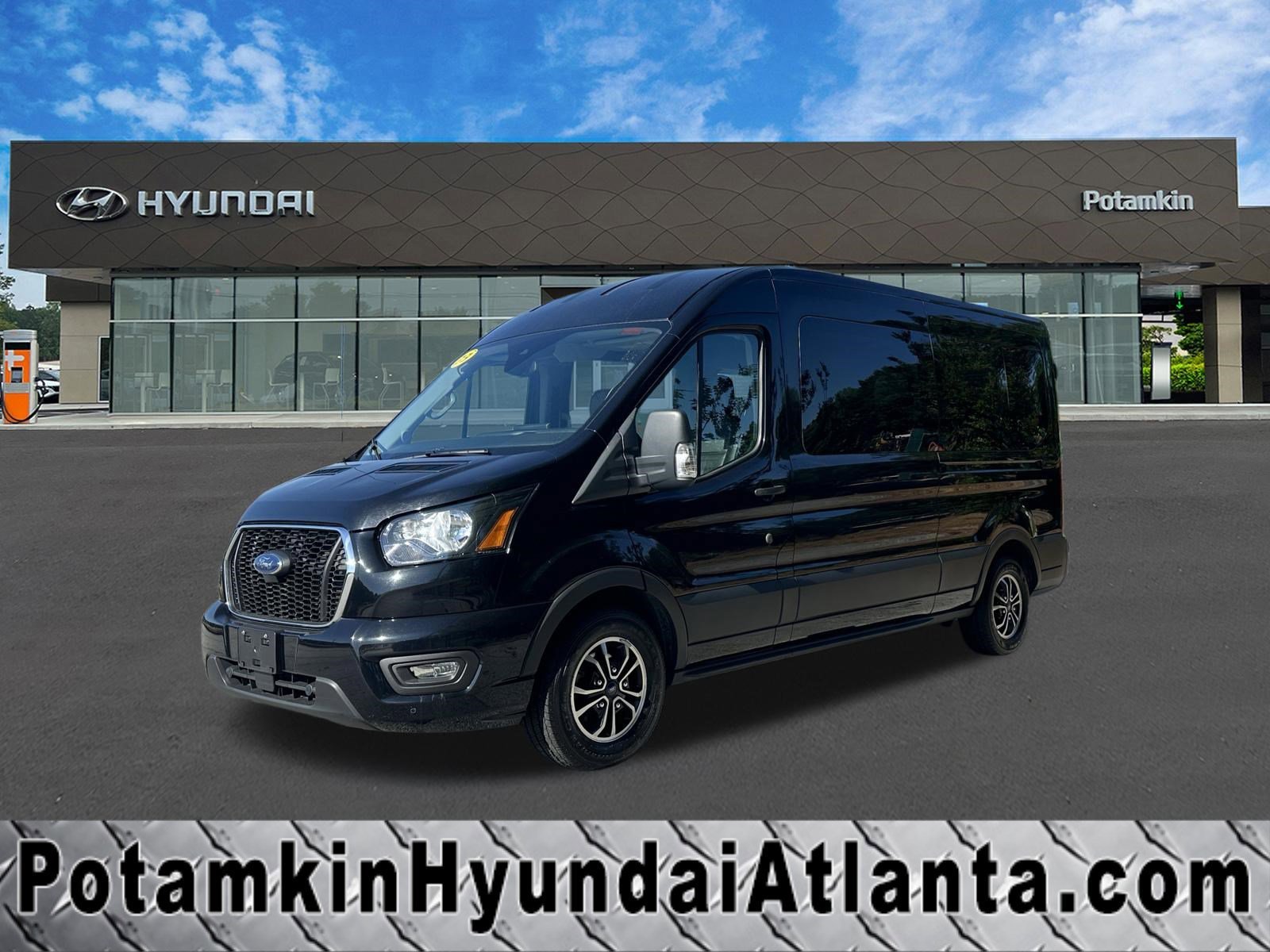 2023 Ford Transit 350 XLT Med Roof Sliding Pass. 148's photo