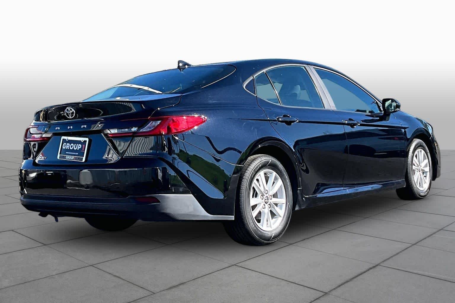 Used 2025 Midnight Black Metallic Toyota LE image 13