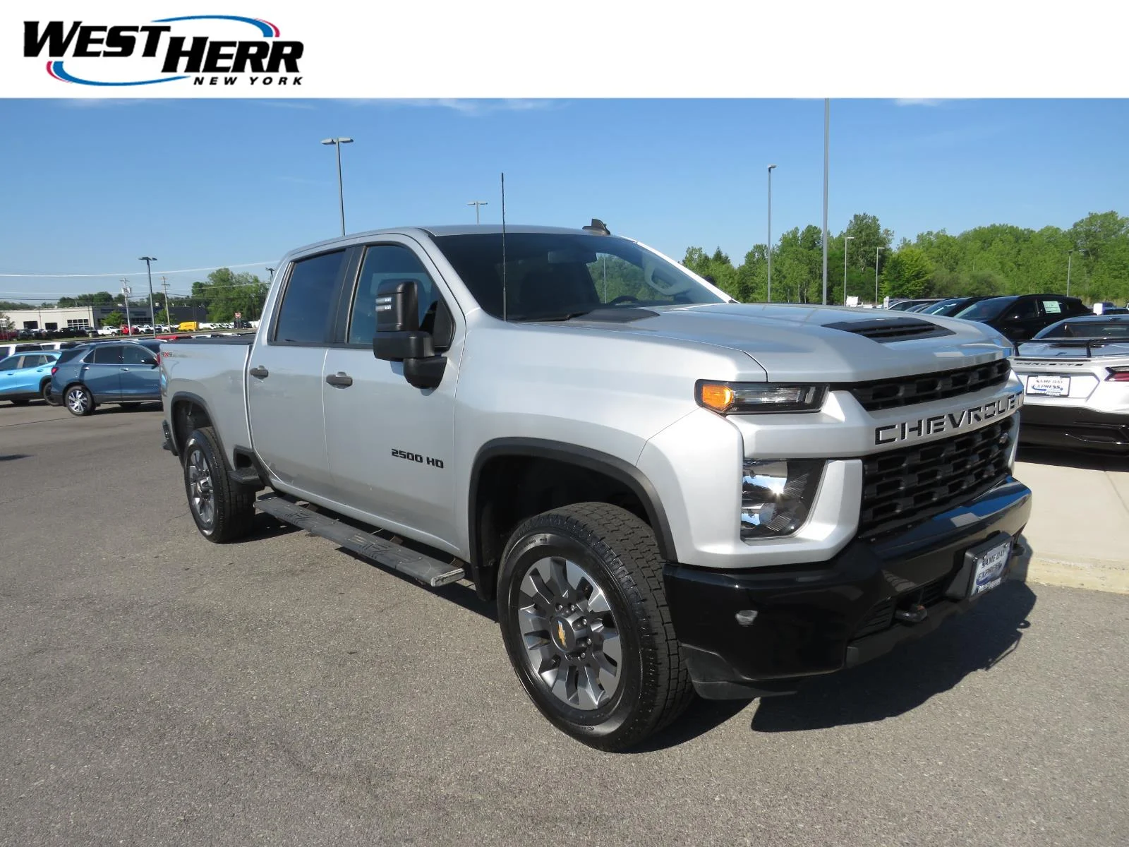 Used 2021 Silver Ice Metallic Chevrolet Custom image 1