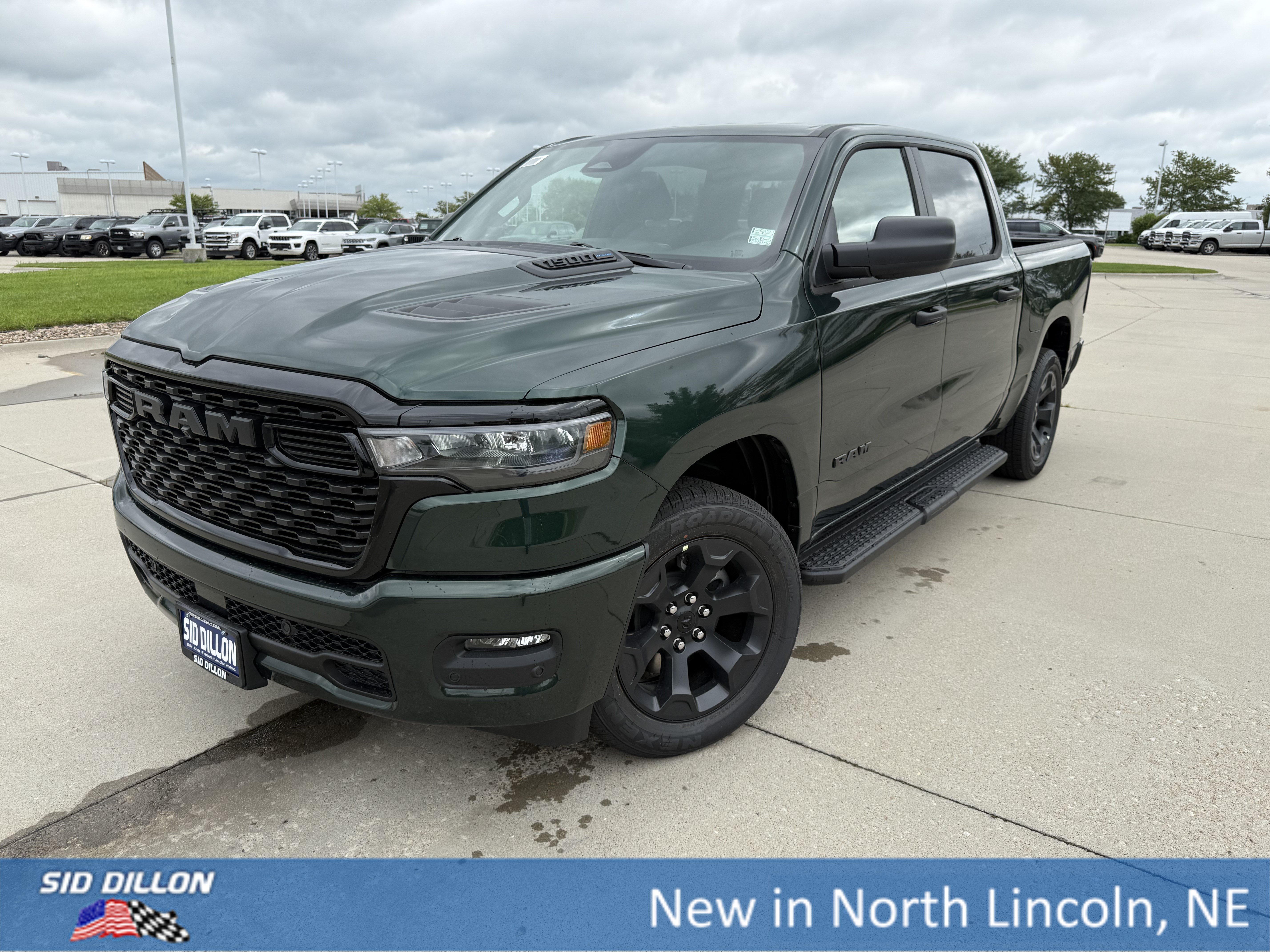 New 2026 Serrano-Green Metallic Exterior Paint RAM 4WD CREW 5