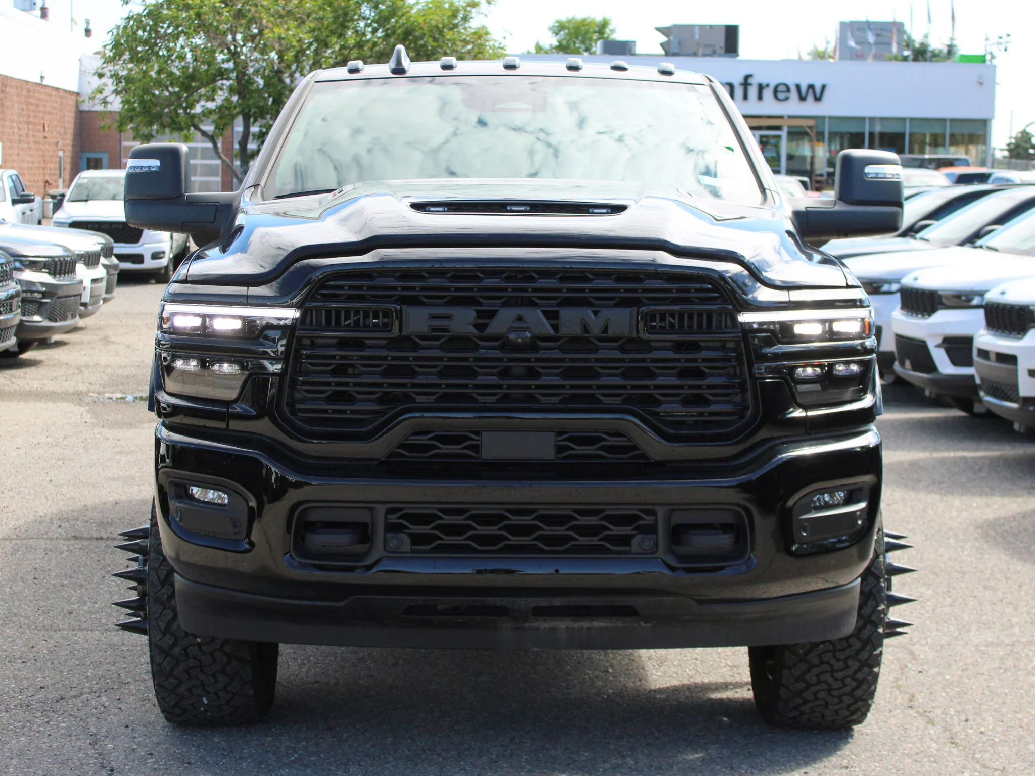 New 2026 Black RAM Limited* Mega Cab, 2 Inch Lift, 22 Inch American Force Wheels image 11