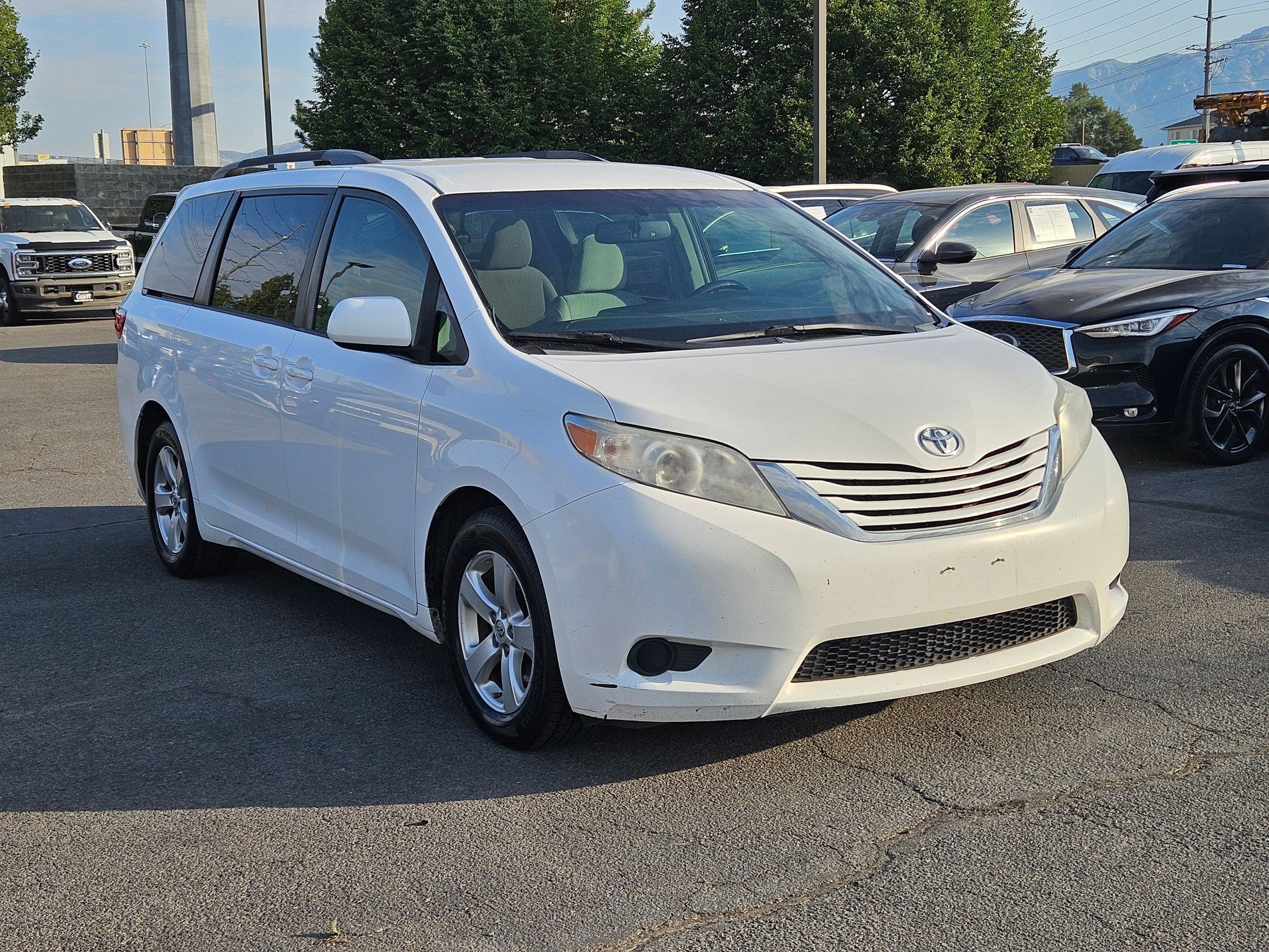 Used 2015 Super White Toyota LE AAS image 12