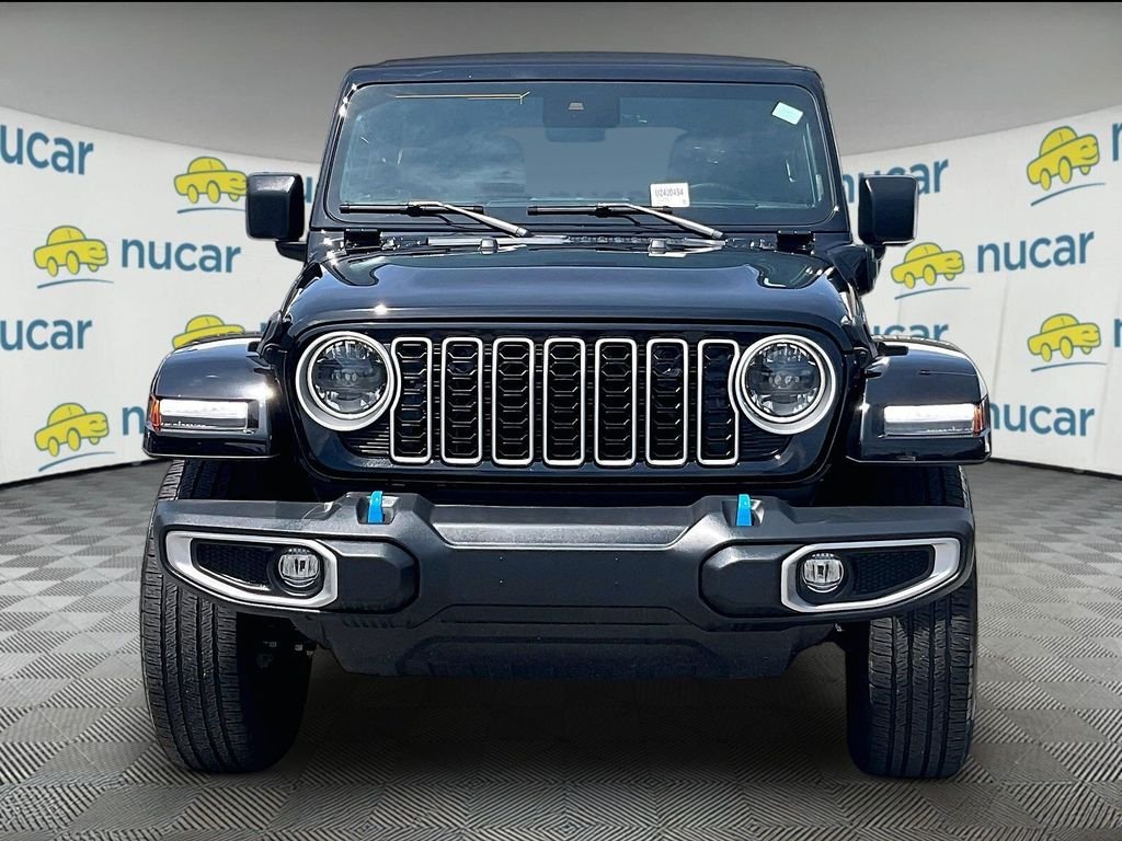 Used 2024 Black Jeep Sahara 4xe image 2