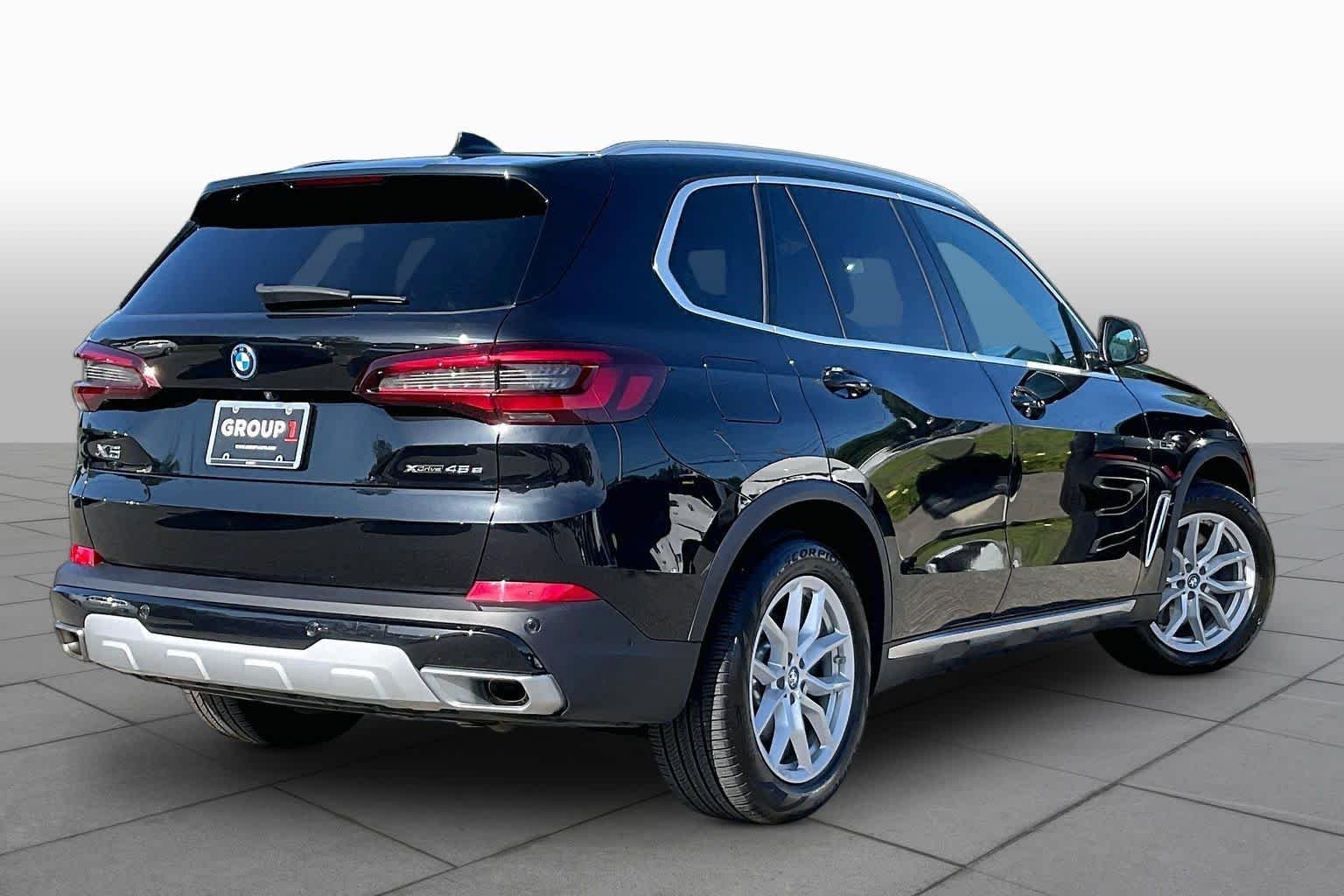 Used 2023 Black Sapphire Metallic BMW xDrive45e image 12
