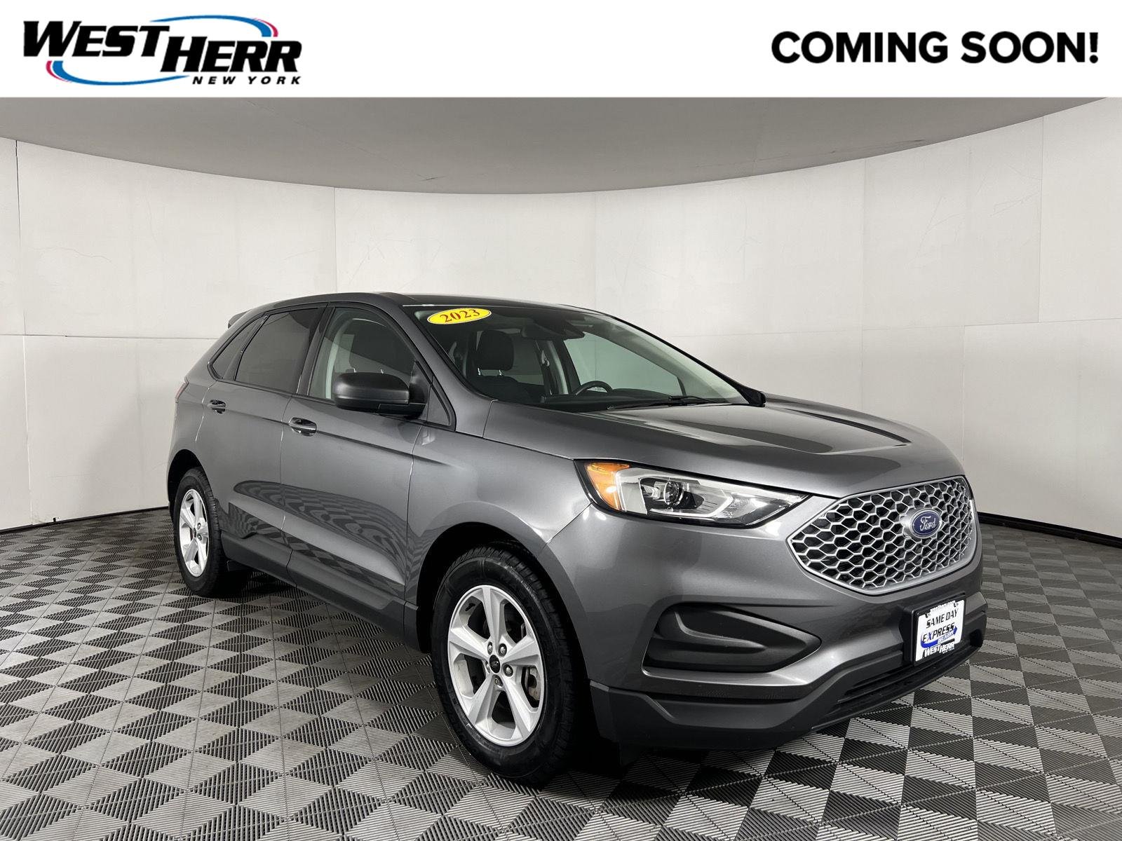 Used 2023 Carbonized Gray Ford SE image 1