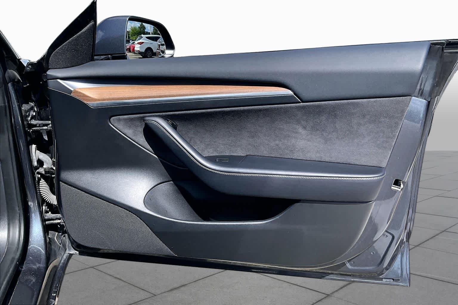 Used 2023 Solid Black Tesla  image 19