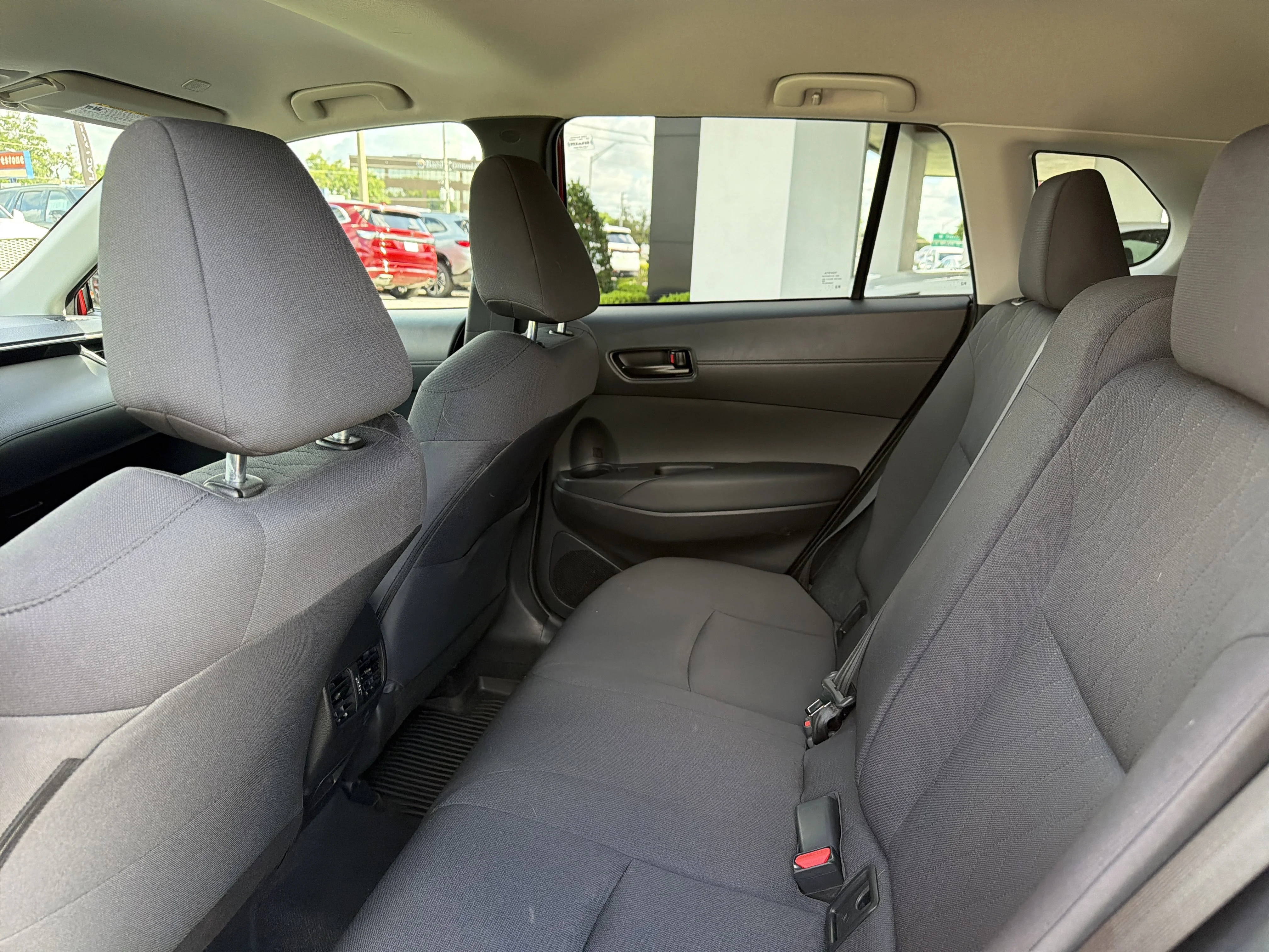 Used 2023 Barcelona Red Metallic Toyota LE image 13