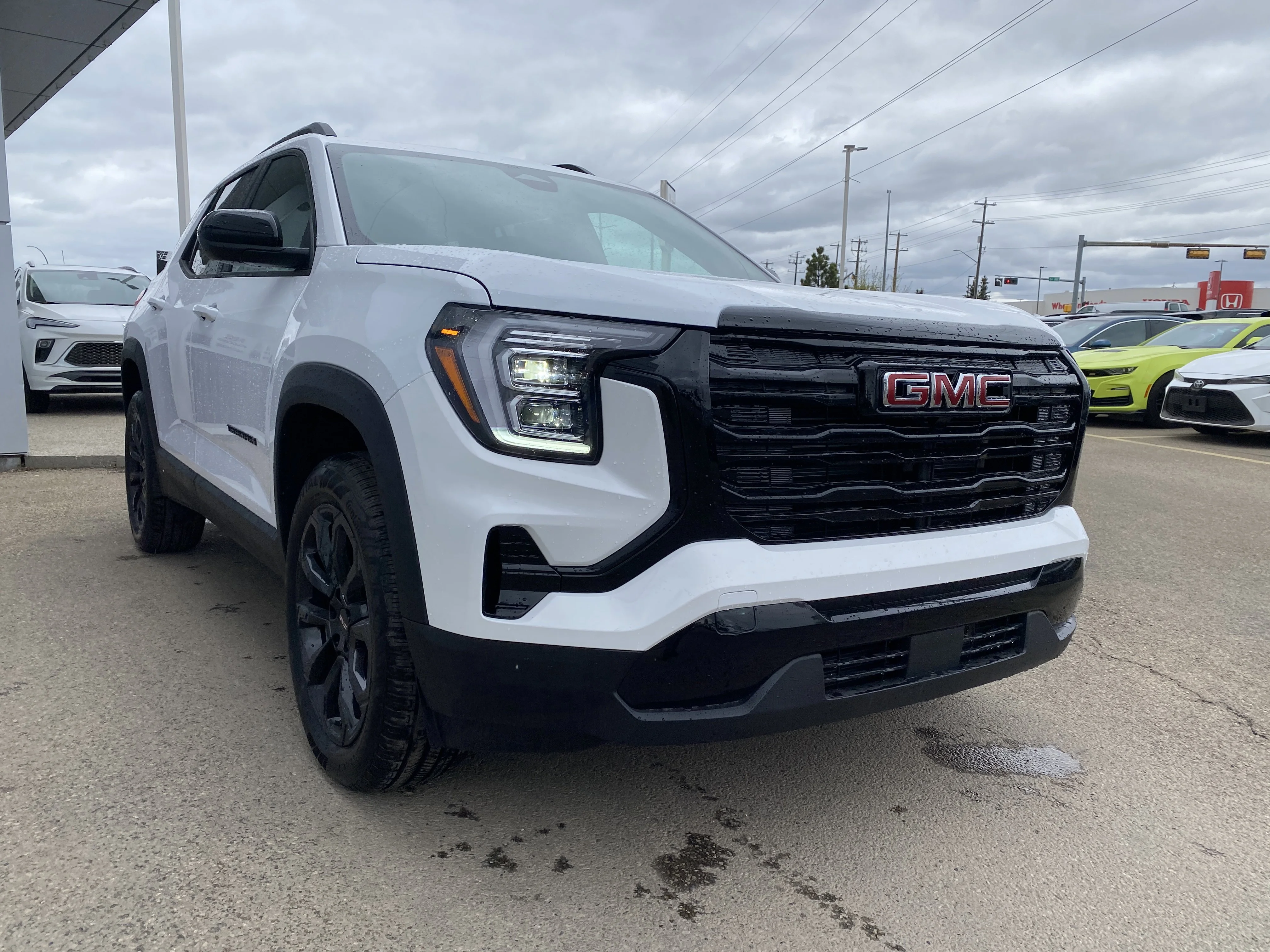 New 2026 Summit White GMC AWD Elevation image 8