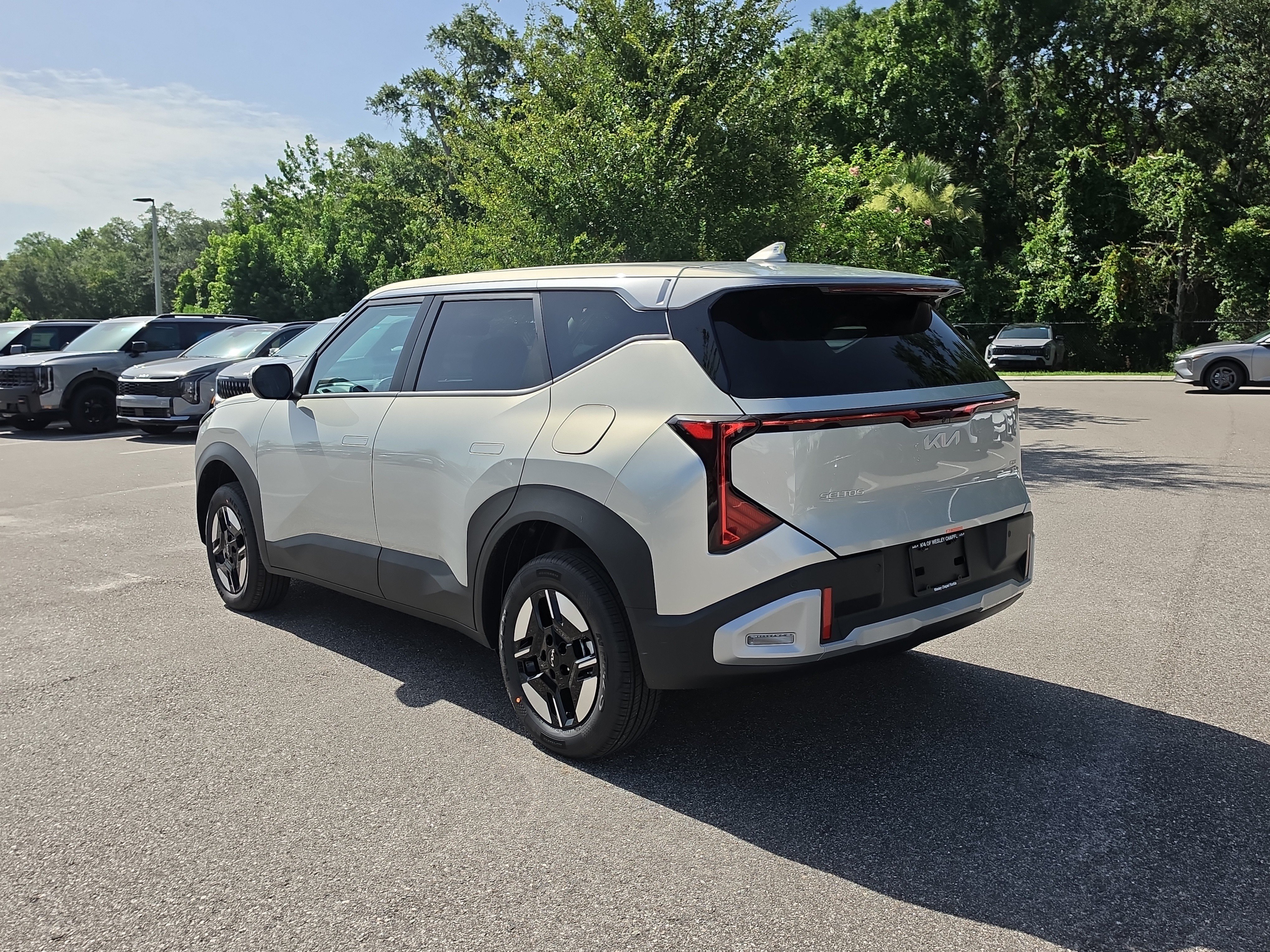 New 2027 Ivory Silver Kia LX image 6