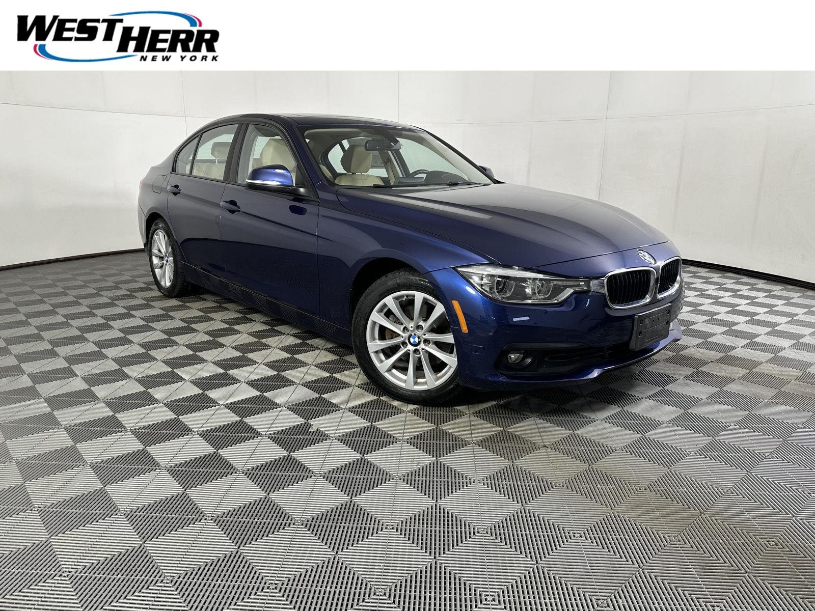 Used 2018 Mediterranean Blue Metallic BMW 320i xDrive image 1