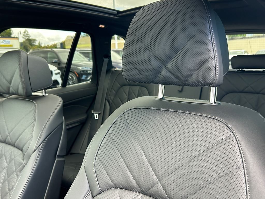 New 2026 Black Sapphire Metallic BMW xDrive50e image 14