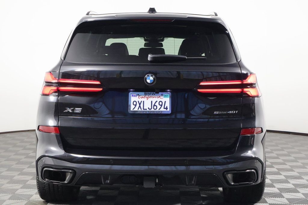 Certified Used 2026 Black Sapphire Metallic BMW sDrive40i image 5