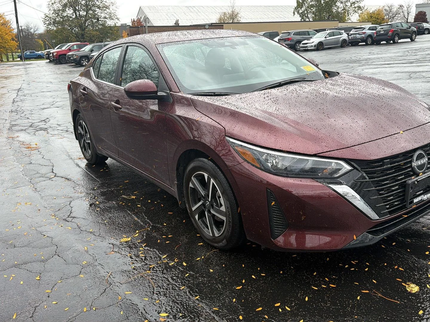 Used 2024 Rosewood Metallic Nissan SV image 7