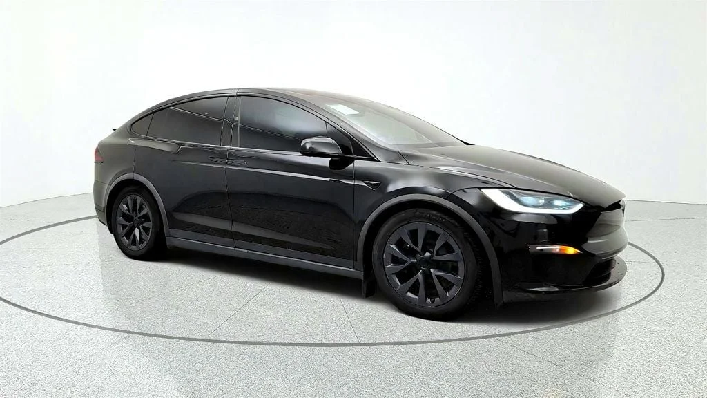 Used 2023 Solid Black Tesla AWD image 3