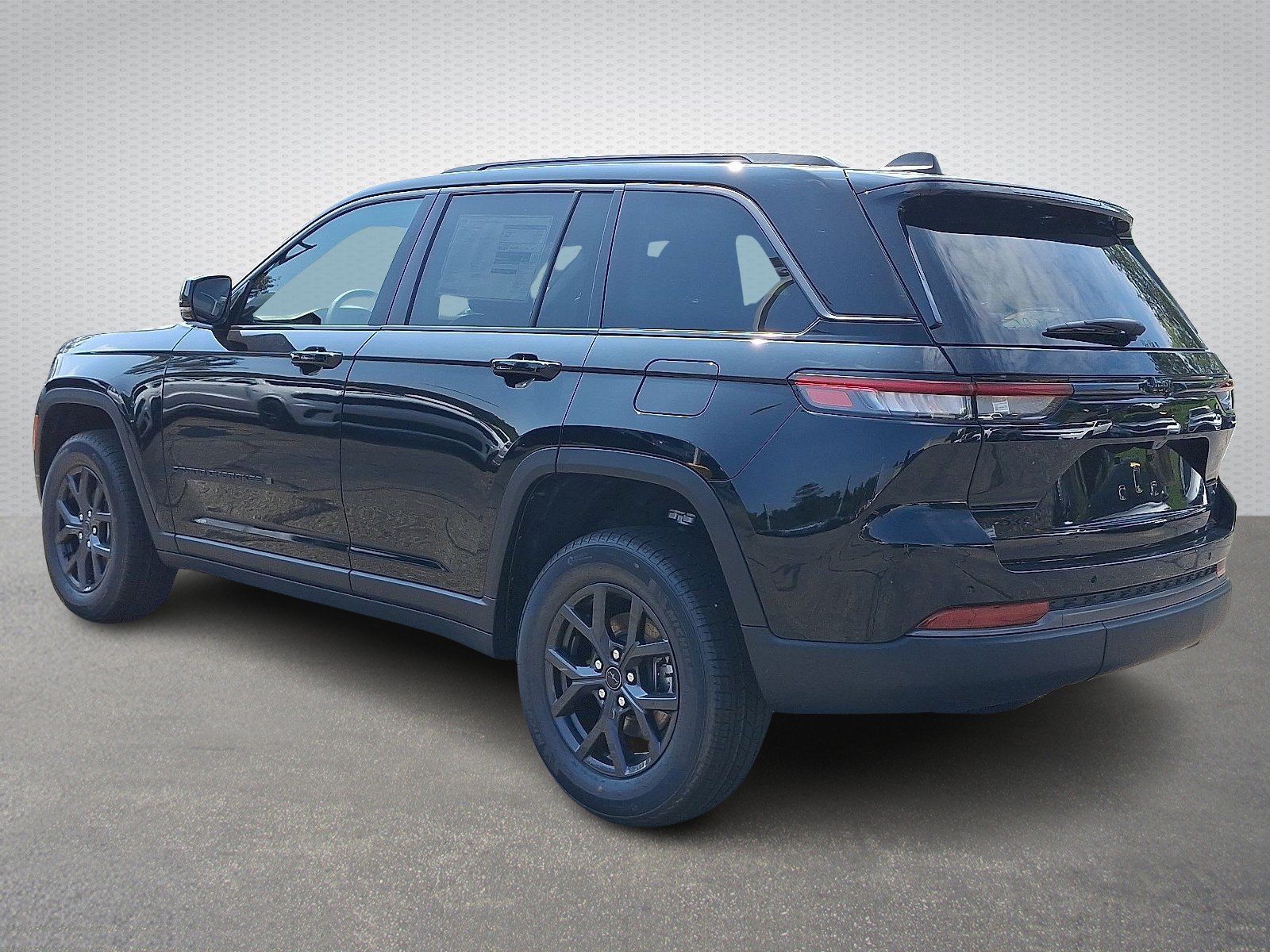 New 2027 High-Gloss Black Paint Jeep Laredo Altitude 4x4 image 3