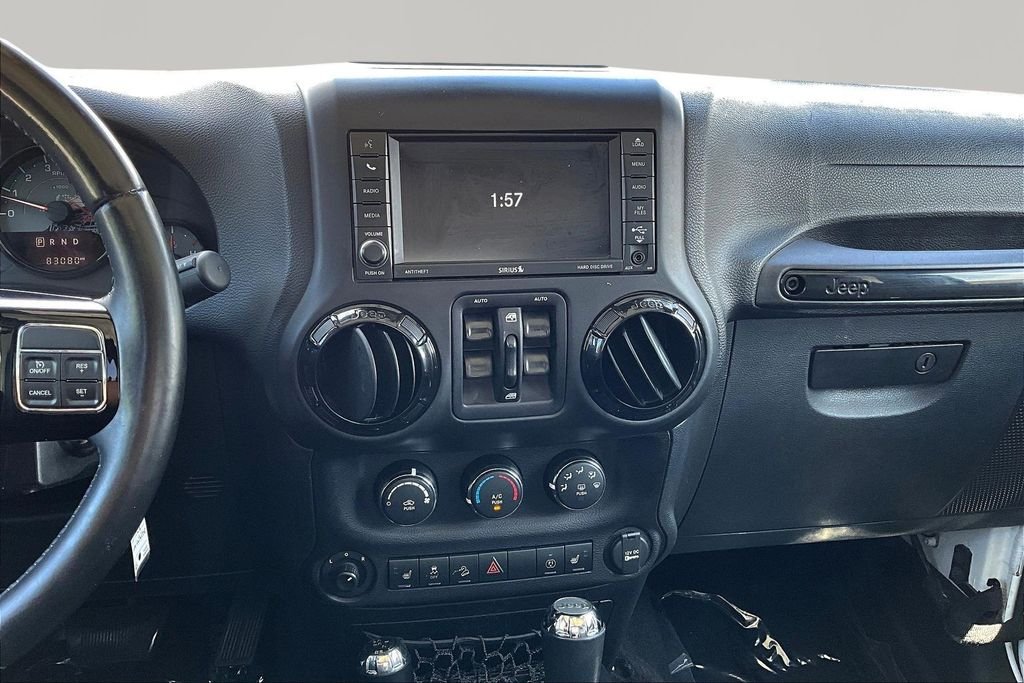Used 2016 White Jeep Unlimited Sahara image 12
