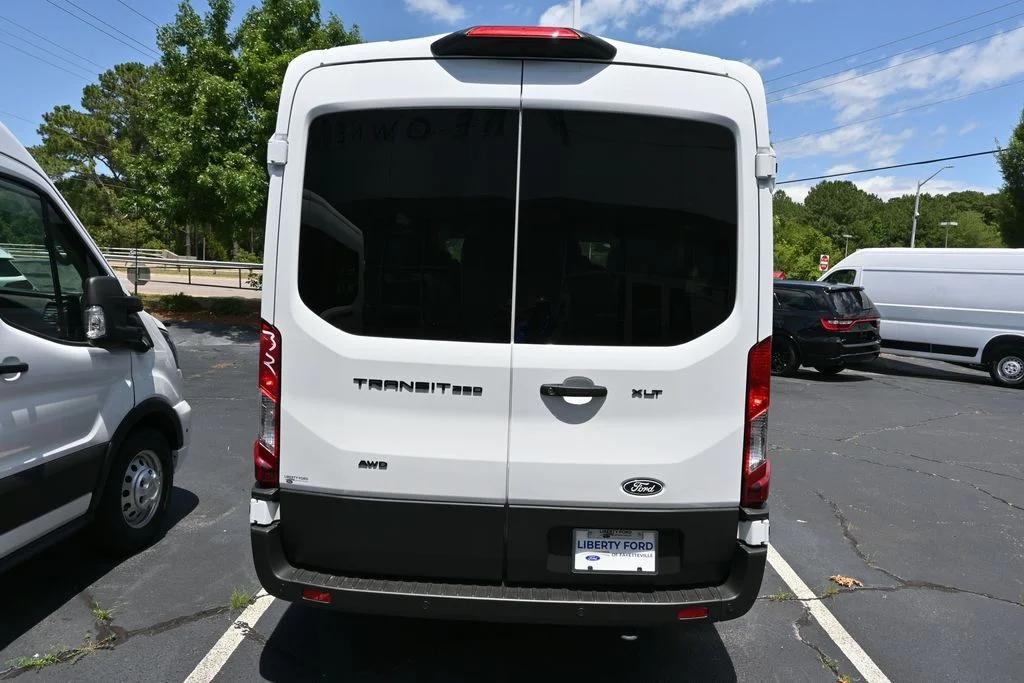 New 2026 Oxford White Ford Passenger Van XLT image 30