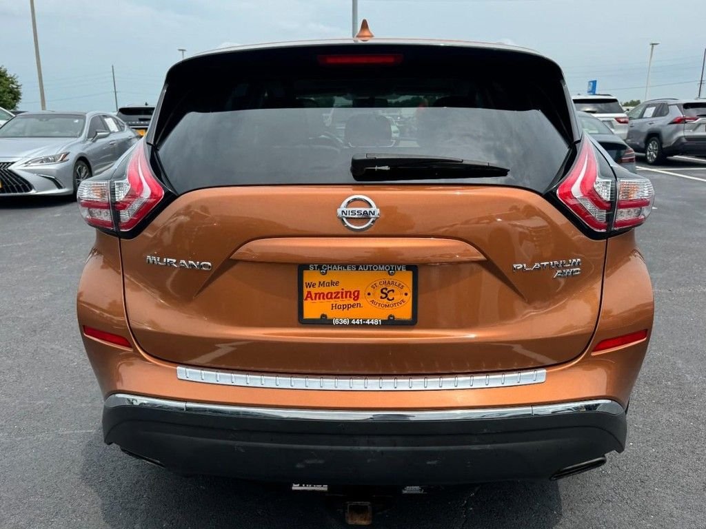 Used 2017 Orange Nissan Platinum image 4