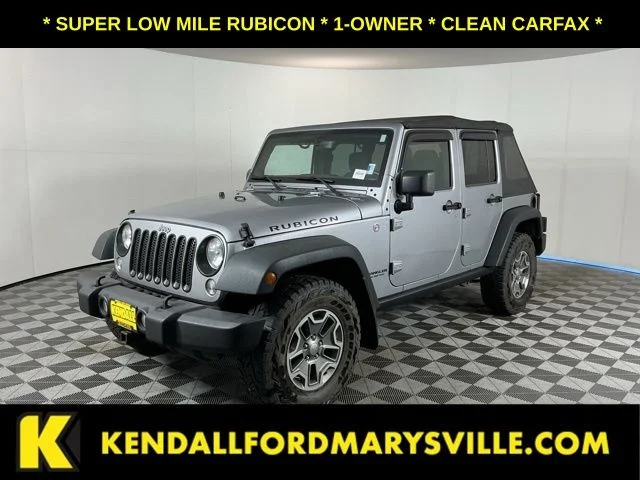 Used 2015 Silver Jeep Unlimited Rubicon image 1