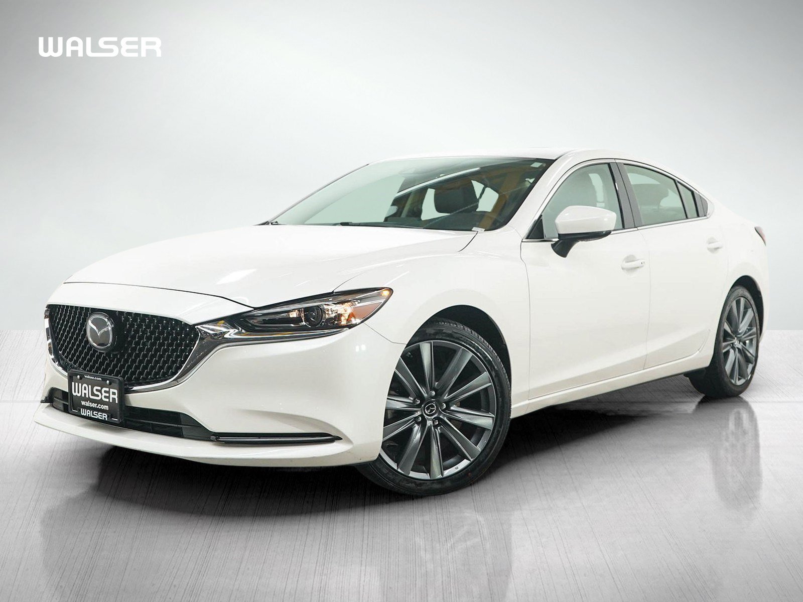 Used 2018 Snowflake White Pearl Mica Mazda Touring image 1