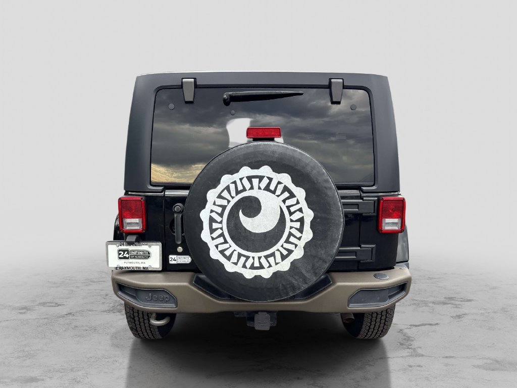 Used 2016 Black Jeep Unlimited Sahara image 4