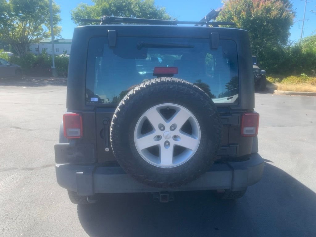 Used 2016 Black Clearcoat Jeep Unlimited Sport image 3