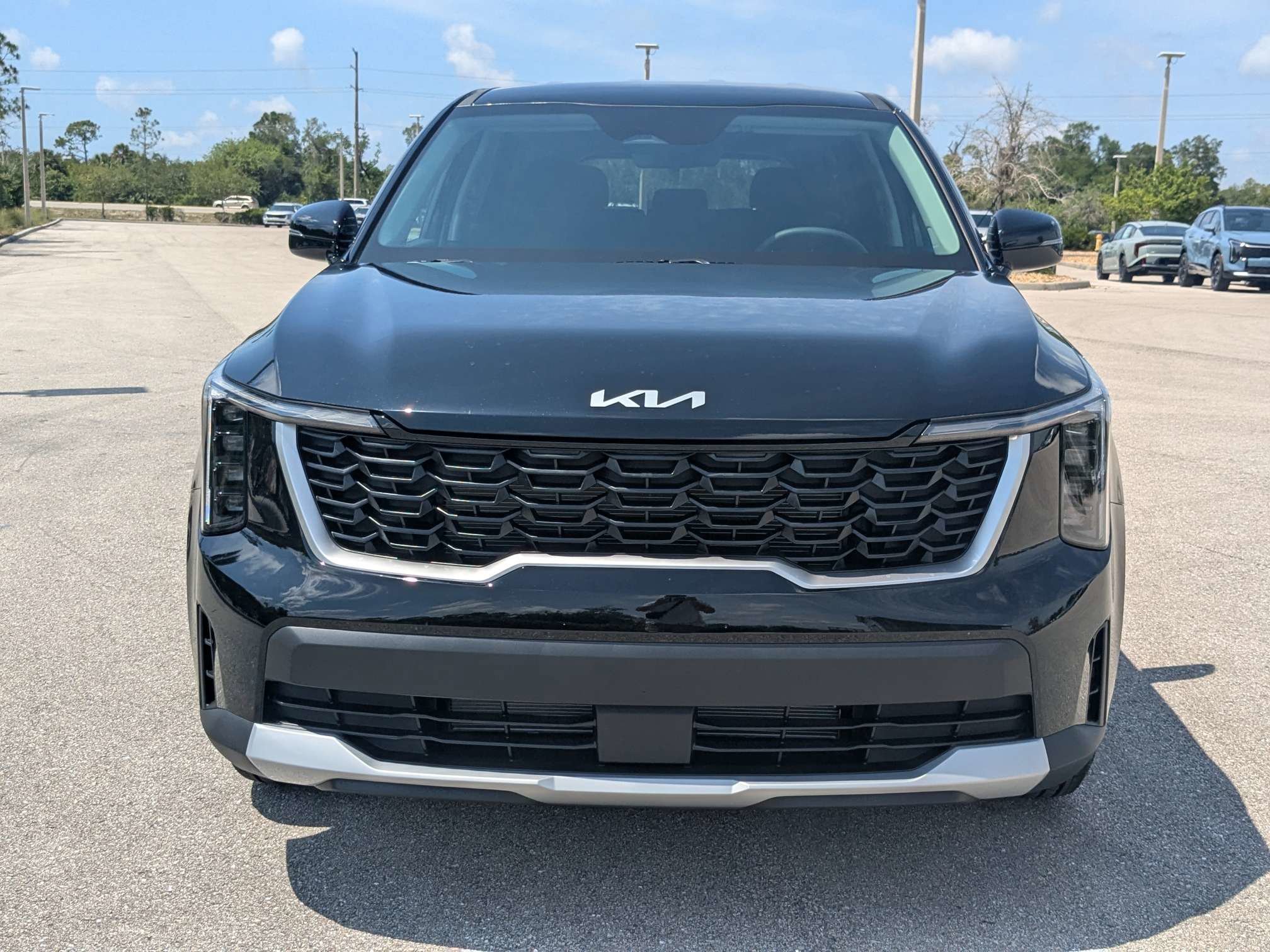 New 2026 Ebony Black Kia LX image 3