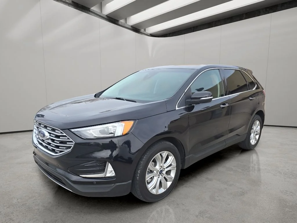 Used 2022 Black Ford Titanium image 1