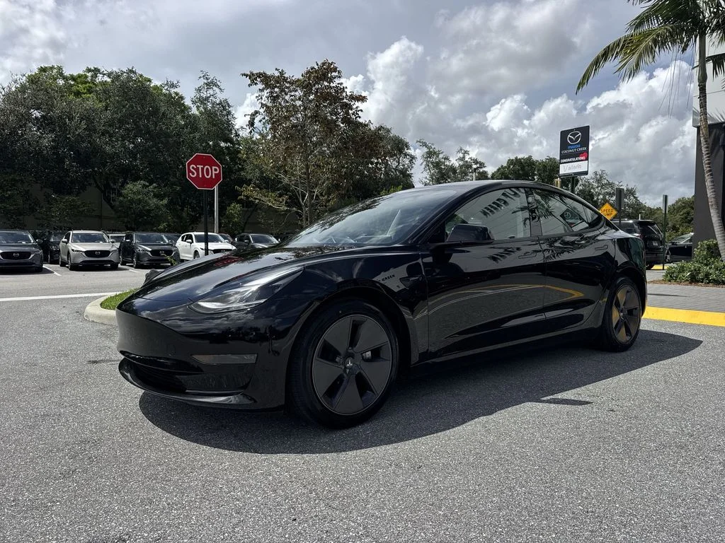 Used 2023 Solid Black Tesla  image 28