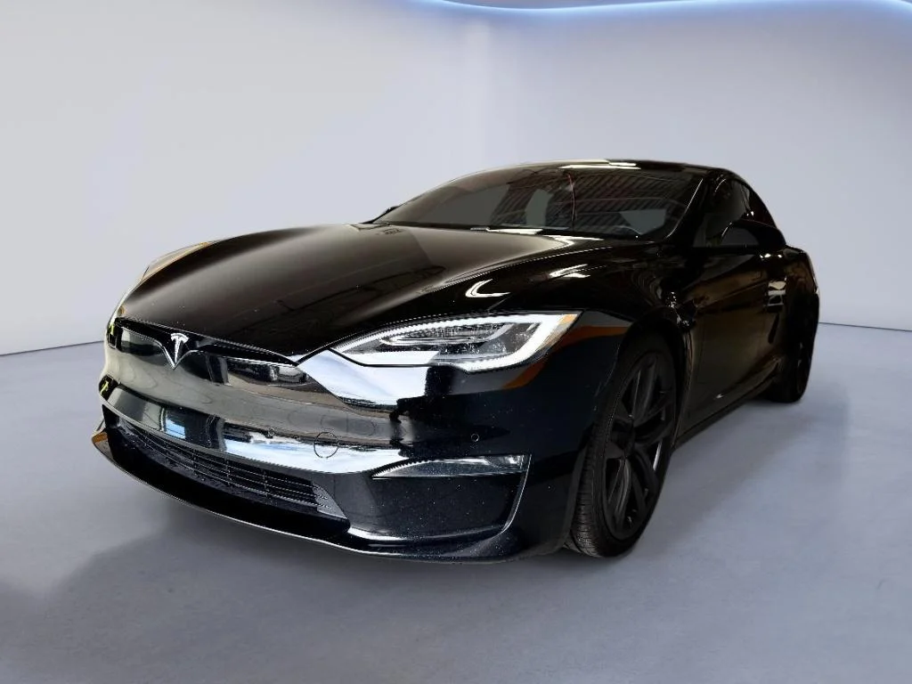 Used 2022 Solid Black Tesla Plaid image 1