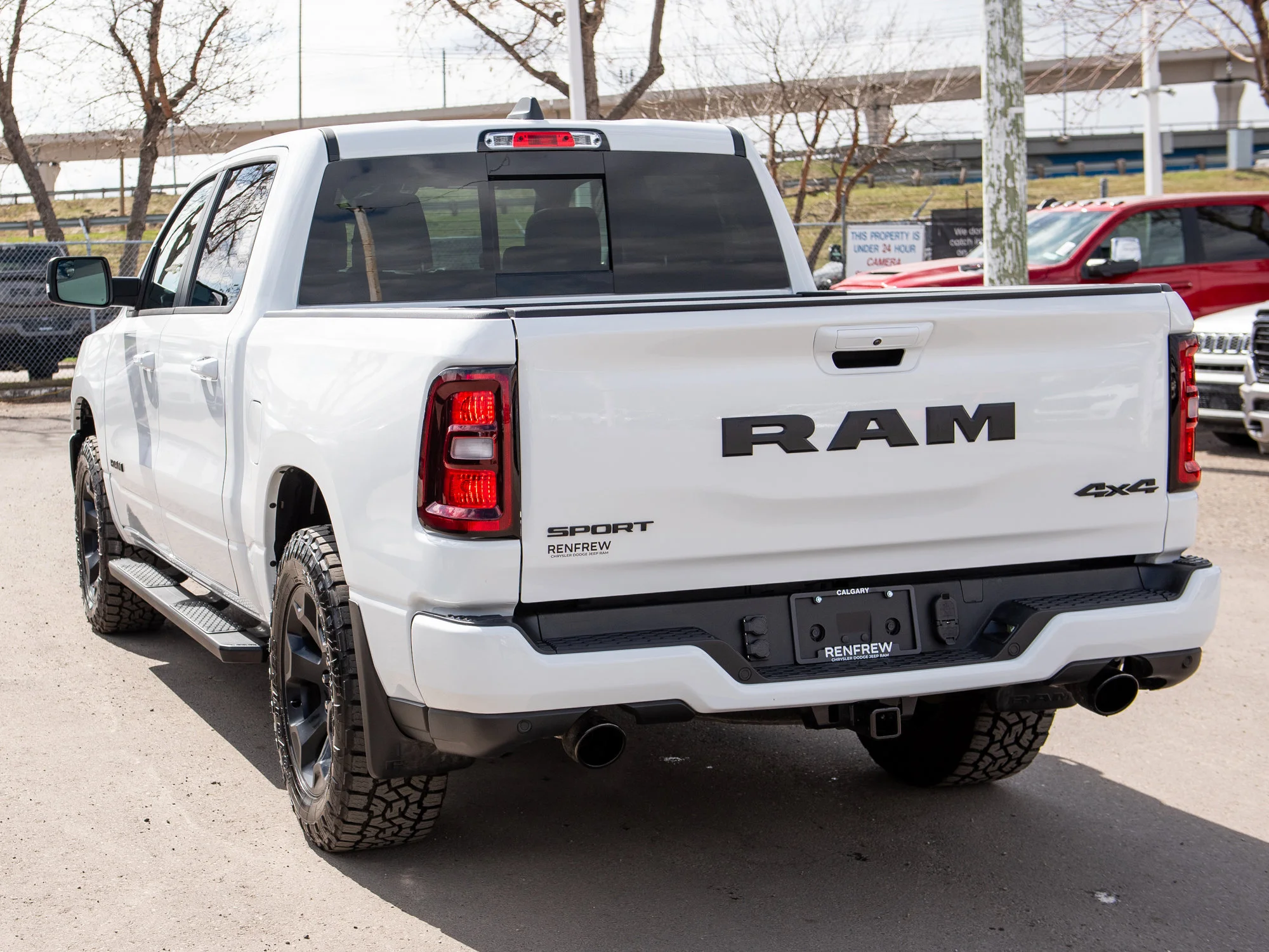 Certified Used 2026 White RAM Sport * Twin-Turbo | Panoramic Sunroof | Apple CarPlay | Lift Kit | Bedliner | 360 Camera | Nav image 14