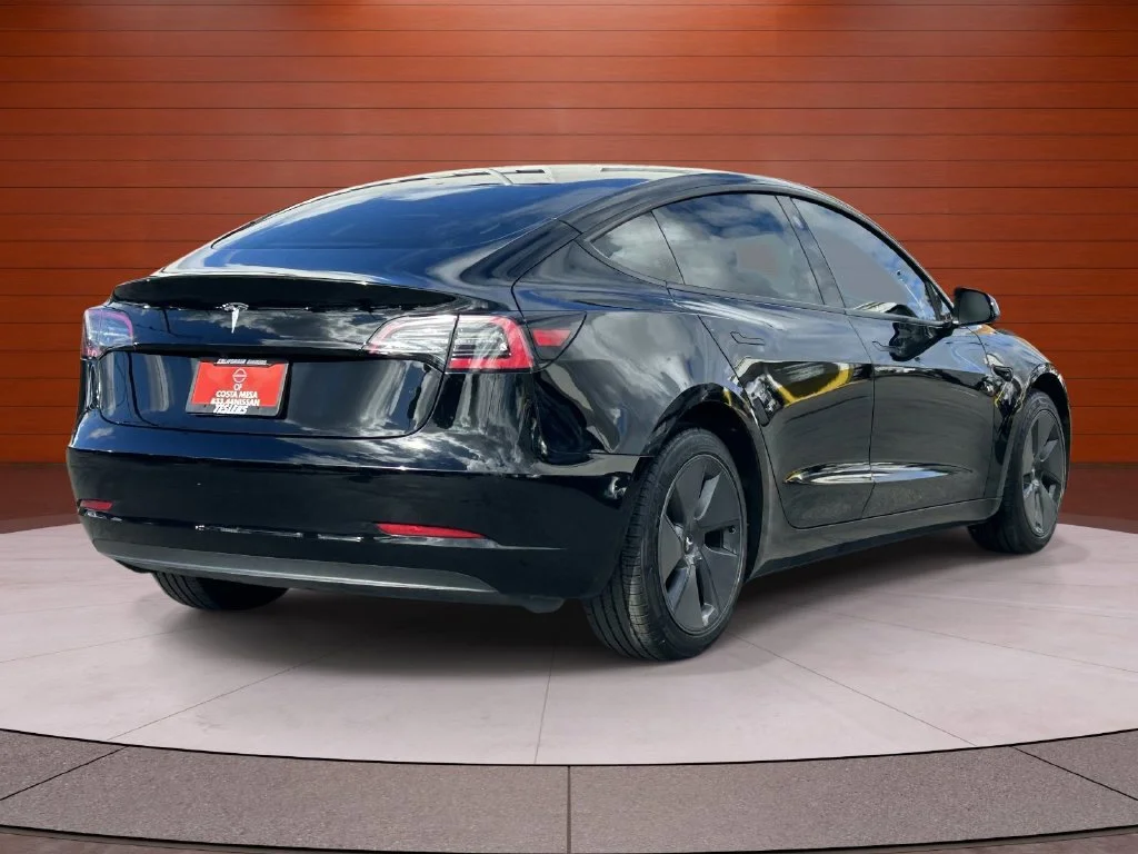 Used 2023 Solid Black Tesla Base image 4