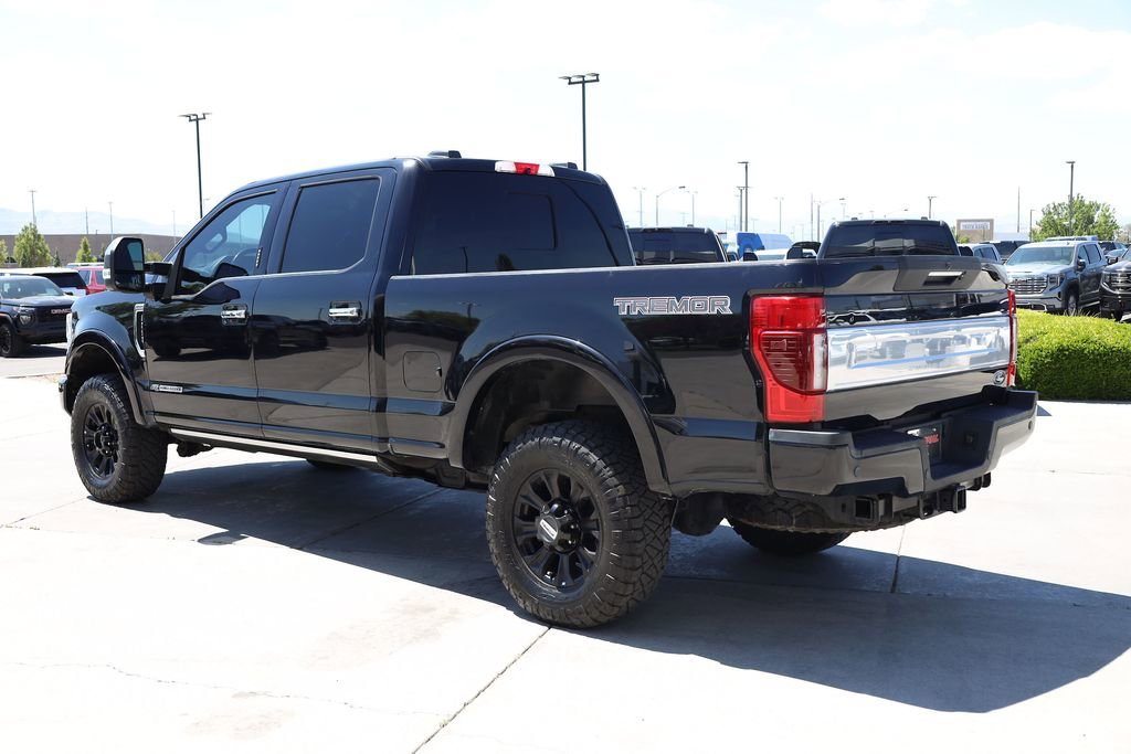 Used 2022 Black Metallic Ford Platinum image 4
