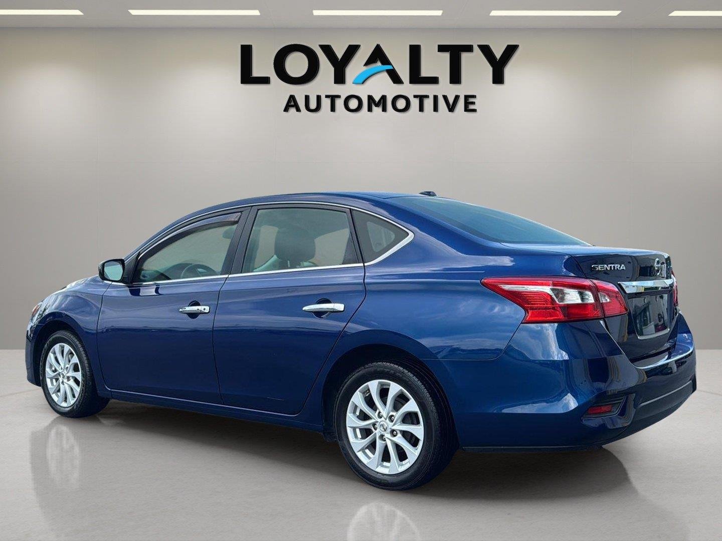 Used 2019 Deep Blue Pearl Nissan SV image 3