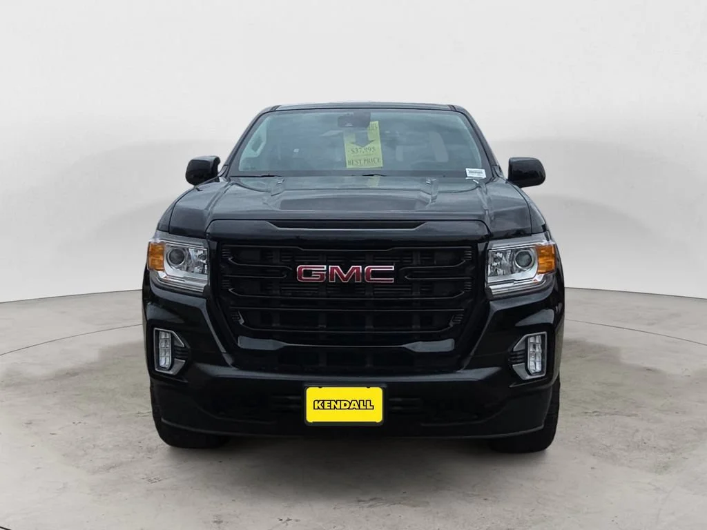 Used 2021 ONYX BLACK GMC 4WD Elevation image 3