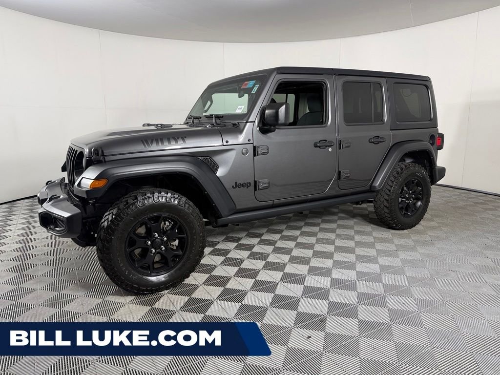 Used 2023 Gray Jeep Sport image 1