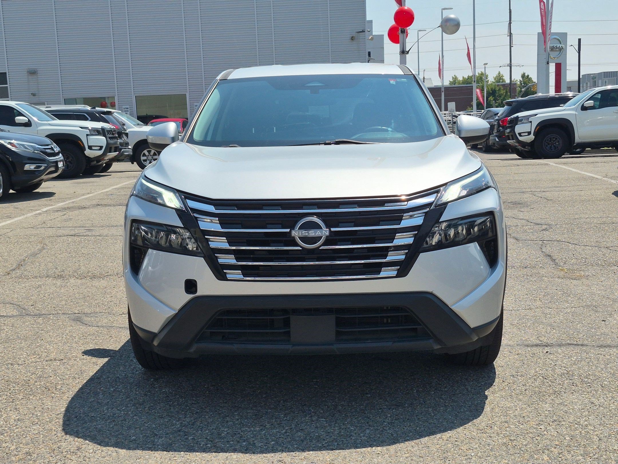Used 2024 Brilliant Silver Metallic Nissan SV image 10