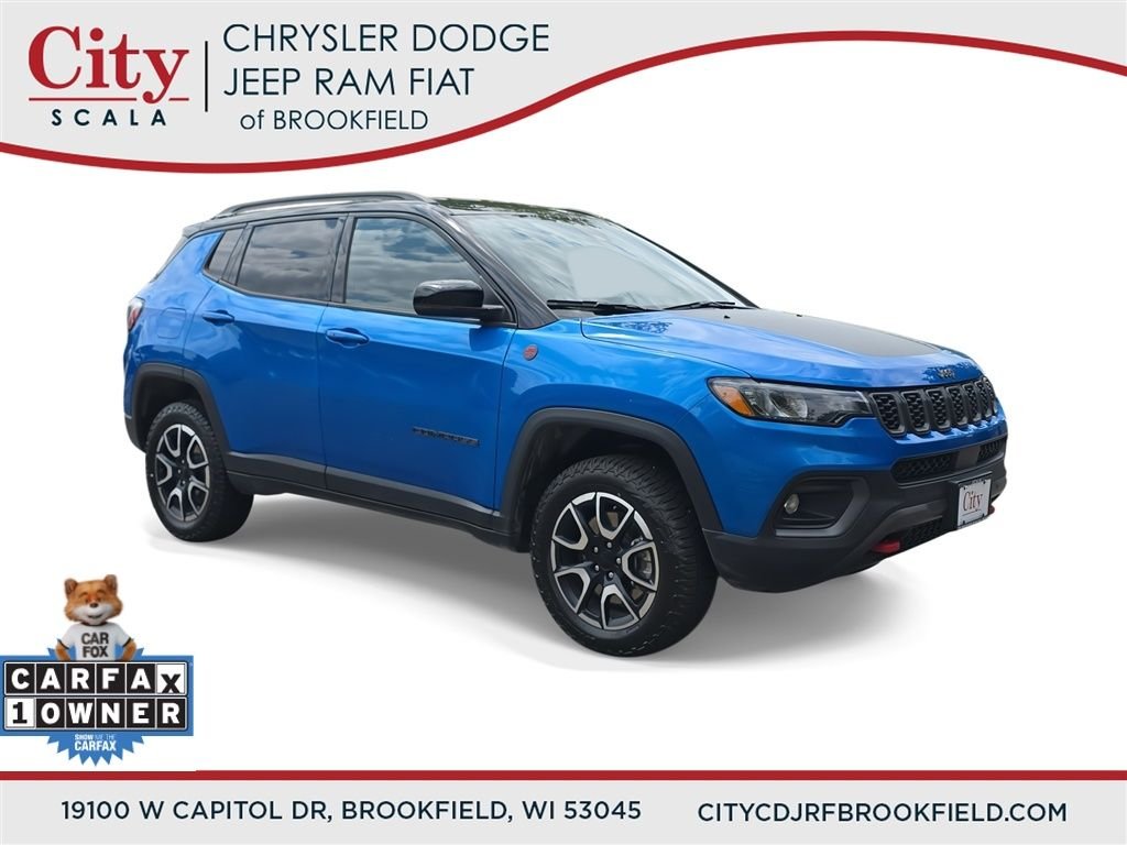Certified Used 2024 Blue Jeep Trailhawk image 1