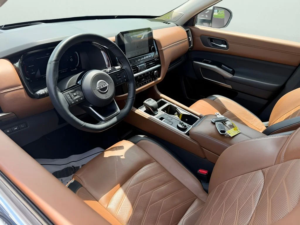 Used 2024 Pearl White Tricoat Nissan Platinum image 14