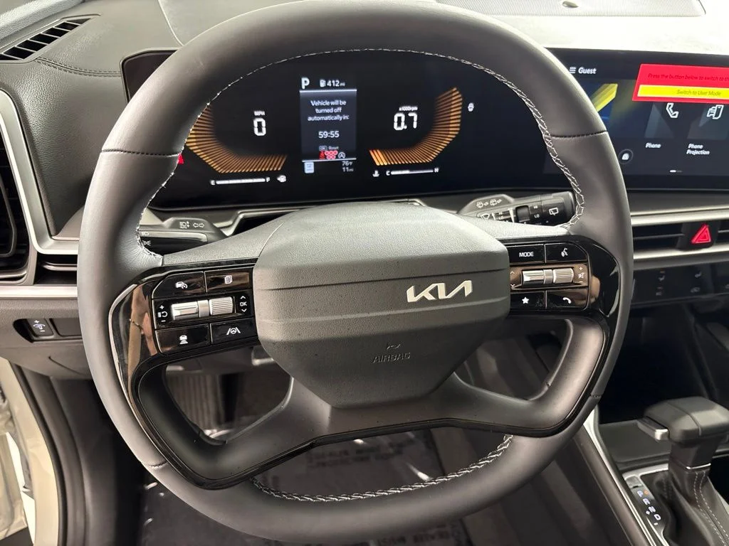 New 2026 Ivory Silver Kia LX image 29