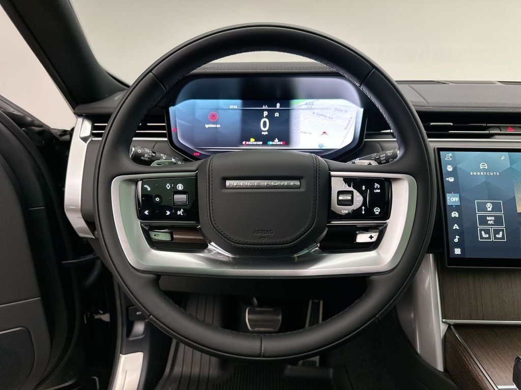 New 2027 Santorini Black Metallic Land Rover SE image 14