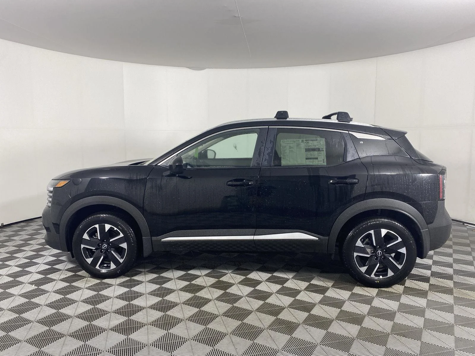 New 2026 Super Black Nissan SV image 14