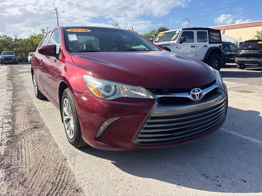 Used 2016 Red Toyota LE image 1