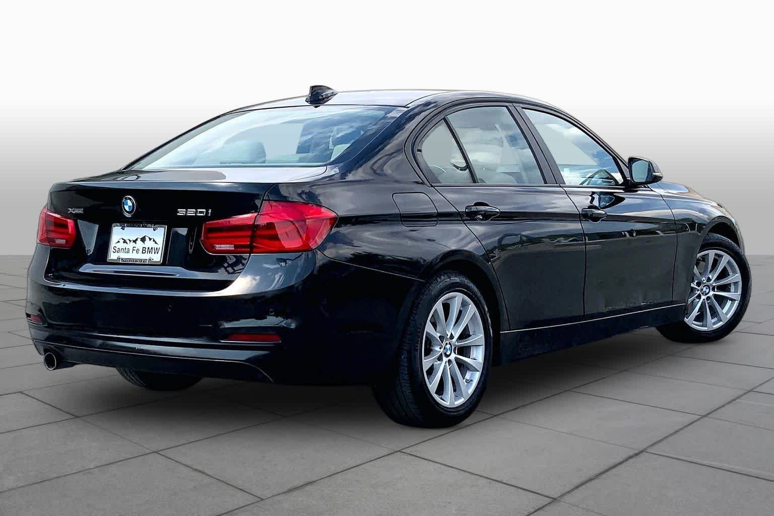 Used 2016 Black Sapphire Metallic BMW 320i xDrive image 12