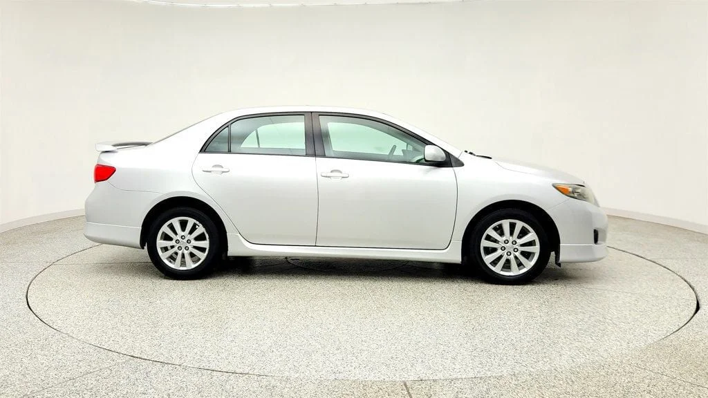 Used 2010 Classic Silver Metallic Toyota 4dr Sedan Manual S w/ Power Moonroof & 16