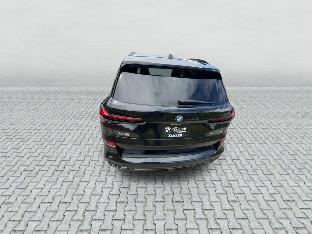 Used 2026 Black Sapphire Metallic BMW xDrive50e image 7