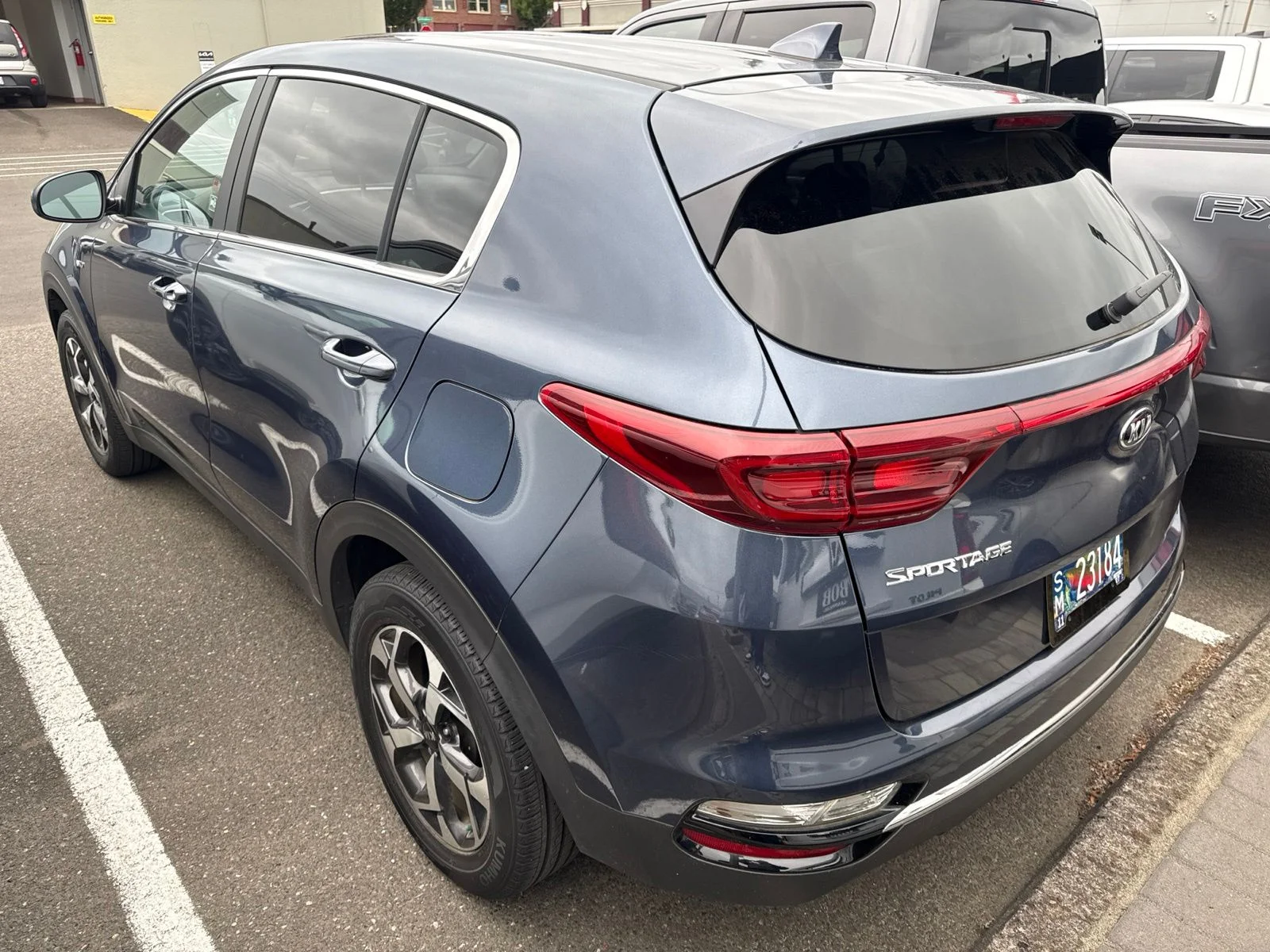 Used 2022 Pacific Blue Kia LX image 3