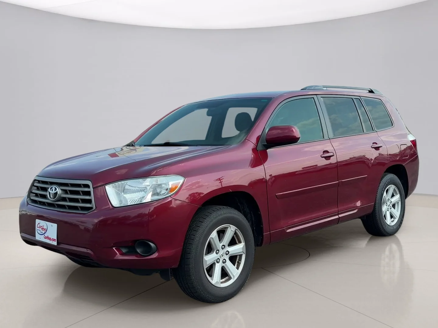Used 2010 Maroon Toyota  image 1