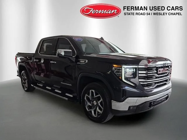 Used 2023 Titanium Rush Metallic GMC SLT image 1